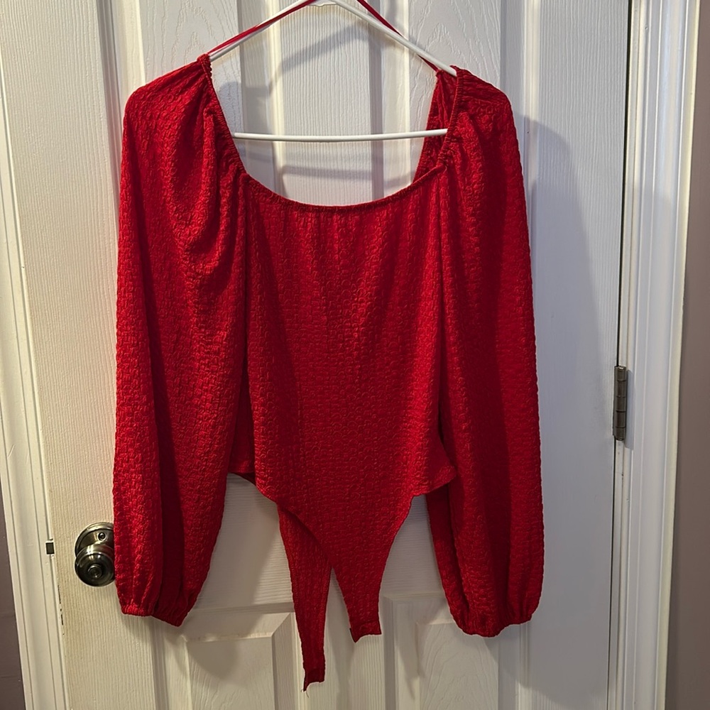 Francesca’s red top